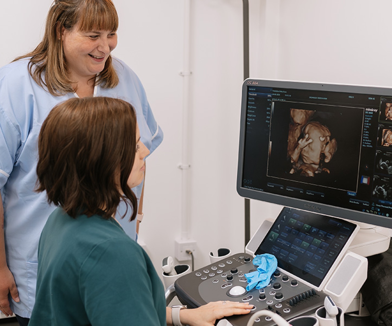 Kate Sutcliffe looking at a 4D scanned baby image on the machine at Yorkshire Baby Scan