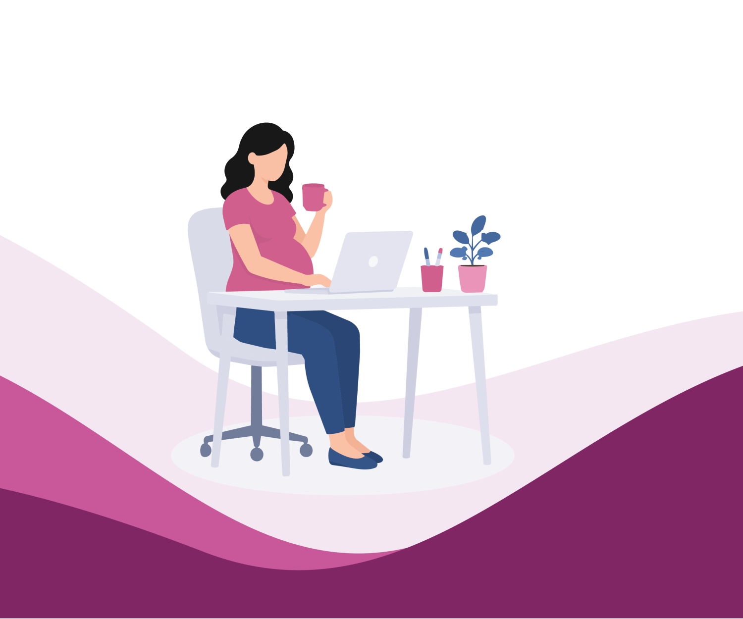 Pregnant woman working on a laptop at a desk